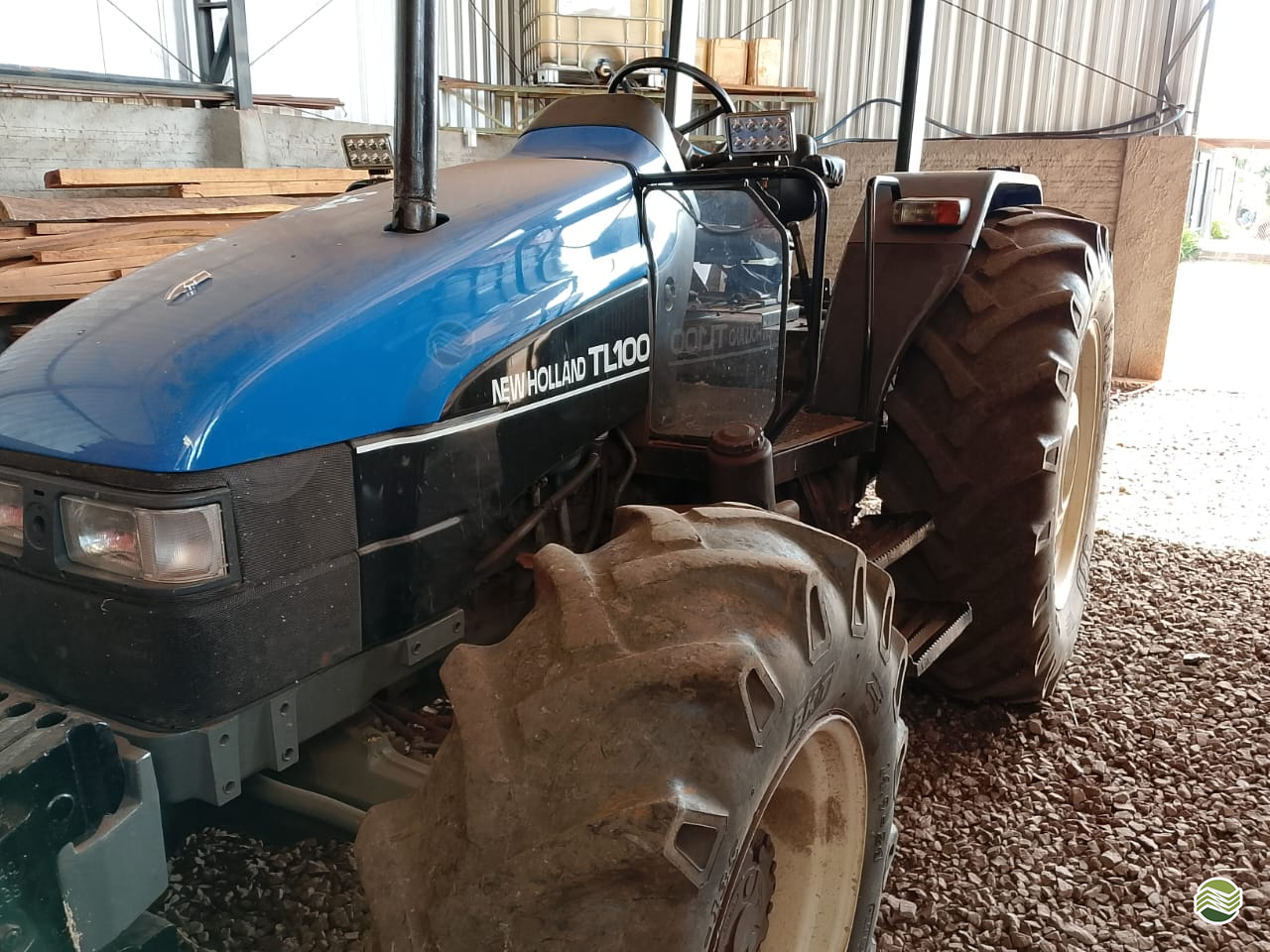TRATOR NEW HOLLAND NEW TL 100 Tração 4x4 Camtrac Máquinas Agrícolas MARIALVA PARANÁ PR
